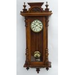 A sprung Vienna Regulator wall clock: an early XX walnut cased 8 day spring driven clock with