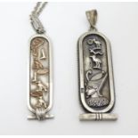 Egyptian Revival Jewellery: 2 Egyptian silver pendants decorated with Egyptian imagery /