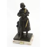 Early 20thC French bronze, Patinated sculpture with a gilded dagger and scabbard on a marble base.