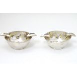 A pair of silver ashtrays hallmarked Birmingham 1939 maker Barker Brothers Silver Ltd.