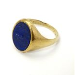 A Gentleman's 1960's 9ct gold signet ring set with lapis lazuli CONDITION: Please