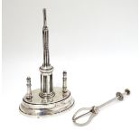 A Victorian silver plate bar top lighter of column form on oval base.