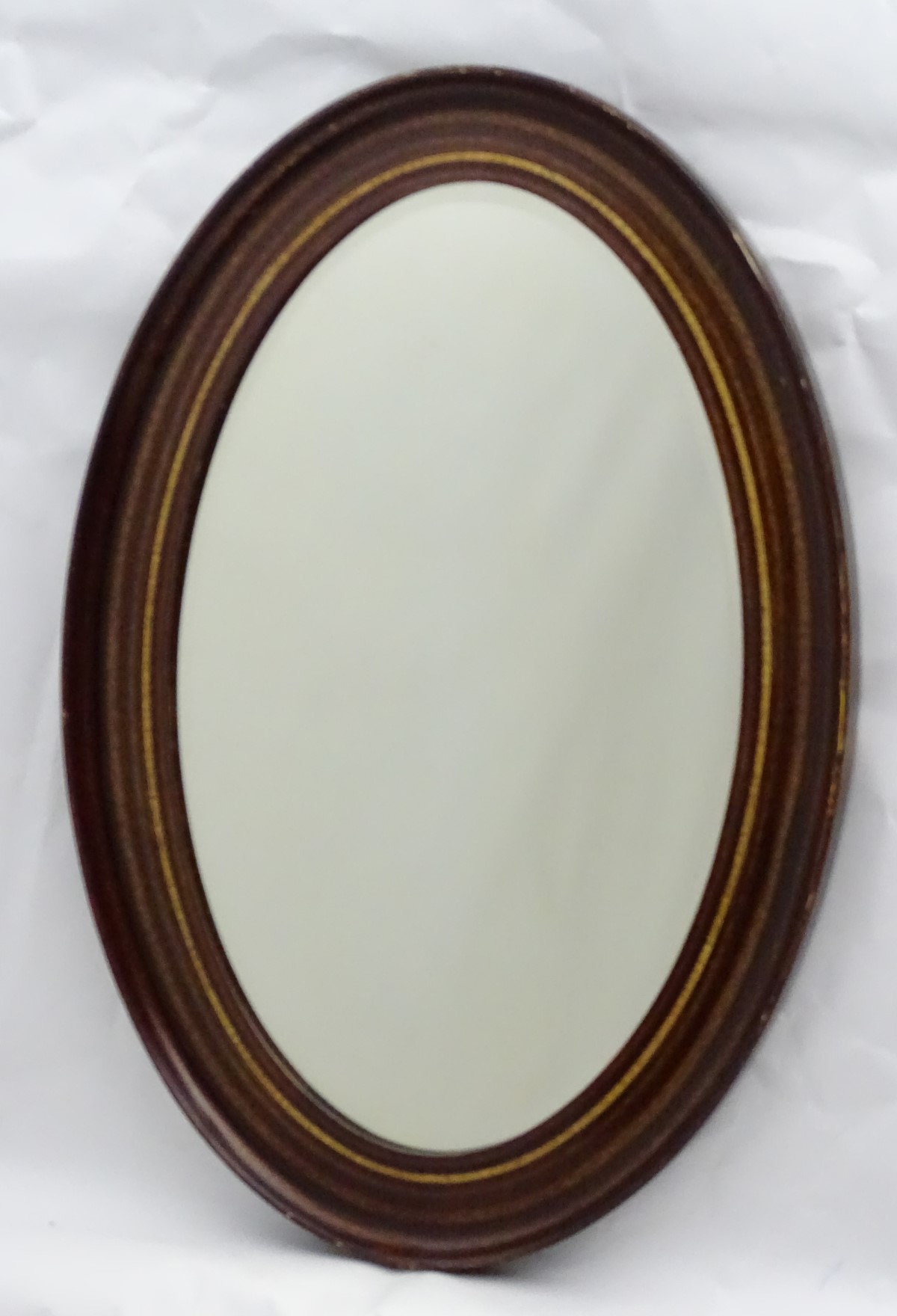 A mid 20thC oval bevelled mirror with crossbanded detailing to the frame. - Image 3 of 10
