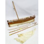 A scale ship lapped constructed model sail boat, the hull titled ' Love and Peace ' .