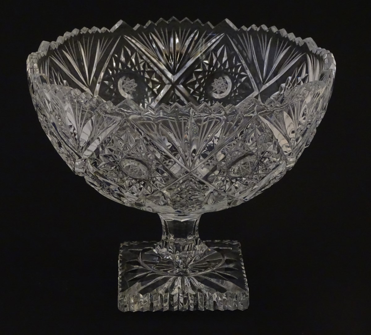 Glass :a cut and pressed moulded lead glass pedestal bowl/tazza with octagonal stem and squared