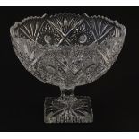 Glass :a cut and pressed moulded lead glass pedestal bowl/tazza with octagonal stem and squared