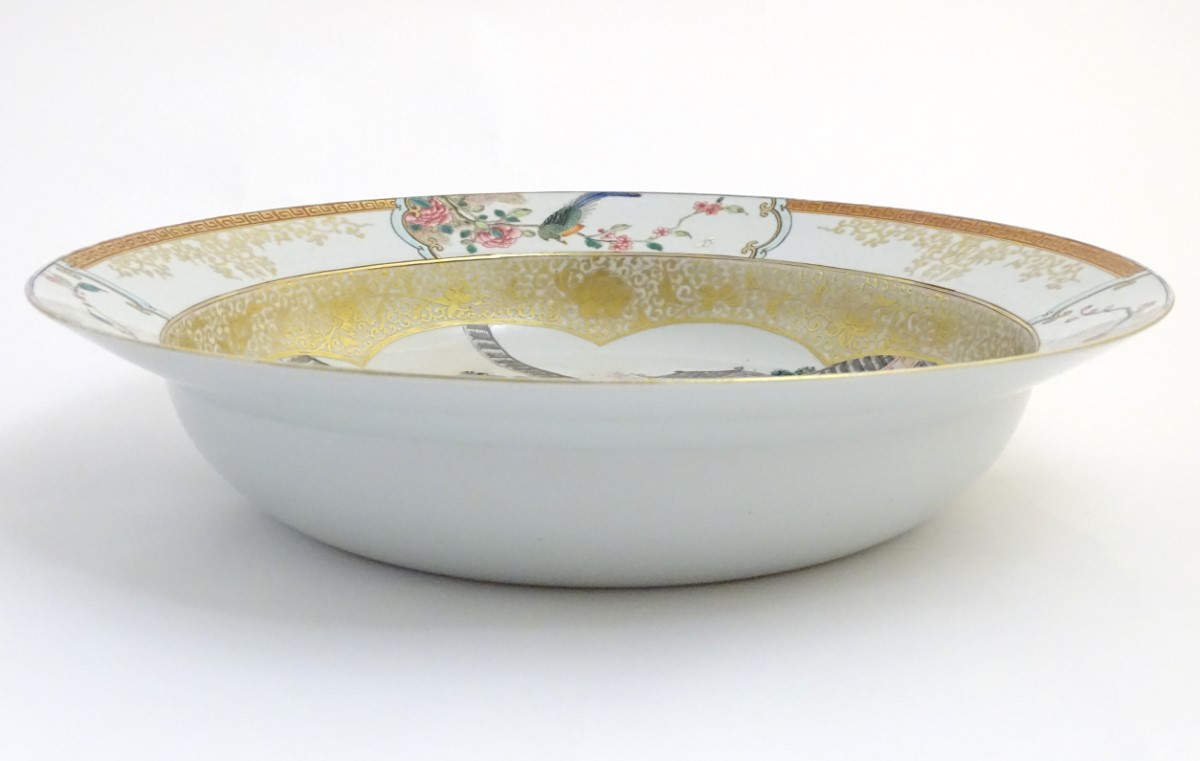 A large Chinese bowl with hand painted scenes of rural life, including a mother and child, - Image 5 of 6