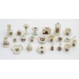 A quantity of local interest crested ware of various forms, including a miniature Toby jug, cups,