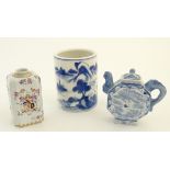 Three assorted Chinese ceramics comprising a blue underglaze brush pot with a mountainous landscape,