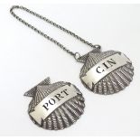 Two silver plate decanter labels / bottle tags of scallop shell form 'Gin' and 'Port.