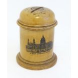 Mauchline: a domed shaped green money box, decorated with an image of 'St.