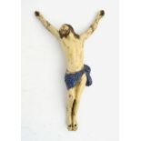 A 18th/19thC glazed ceramic figure of a Corpus Christi. 16" long.