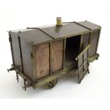 A 19thC brass and bronze scale model of a Railway Freight Wagon. 17” long and 10” high.
