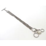 A silver bracelet approx 6" long CONDITION: Please Note - we do not make reference