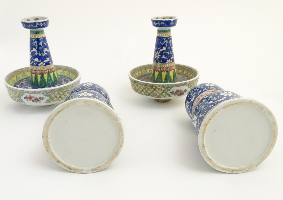 A pair of two-sectional Chinese vases decorated with floral and foliate scrolls. Approx. 17 ¾” high. - Image 2 of 9