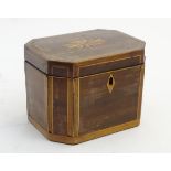 An 18thC Sheraton mahogany tea caddy, with canted corners, fan inlay with satinwood stringing,