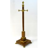 An early / mid 19thC mahogany hat / coat stand with gilt hooks,
