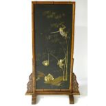 An early 20thC Japanese Aesthetic movement screen on stand, of bamboo and hardwood construction,