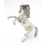 An Egyptian silver model of a horse 4" long CONDITION: Please Note - we do not