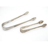 Geo III silver sugar tongs with bright cut decoration,