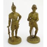 Military: A pair of gilt bronze figures on circular bases.
