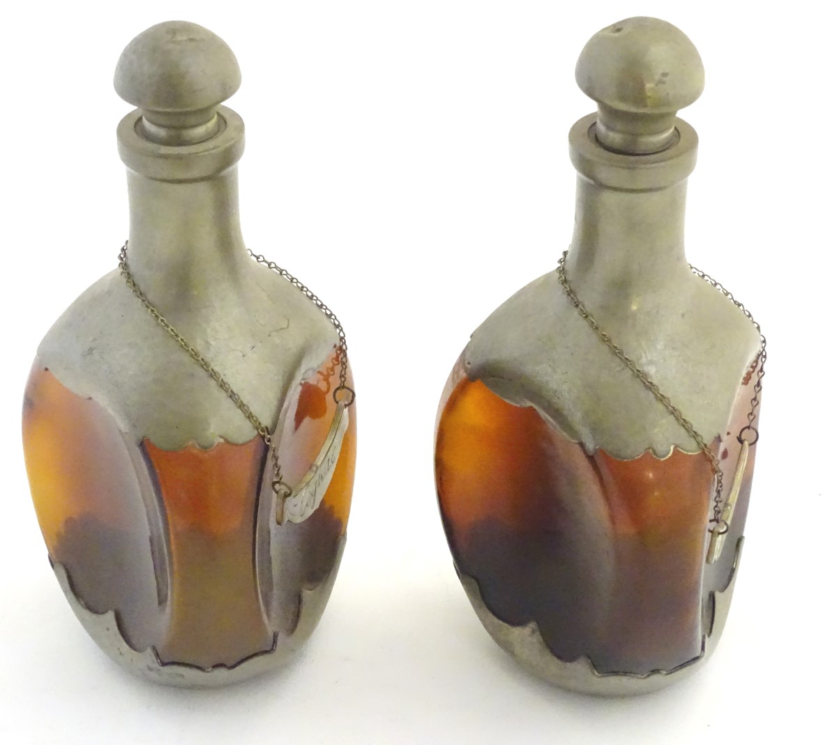 A pair of dimple like brown glass and pewter mounted decanters with bottle tags marked 'Cognac' & - Image 7 of 16