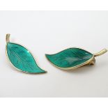 Scandinavian Jewellery: A pair of Norwegian silver gilt earrings of leaf form with green enamel