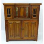 A late 19thC mahogany inverted break front cabinet,