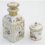 Two Continental lidded ceramic containers; a small pot decorated with hand painted birds,