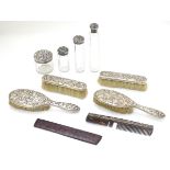 Assorted dressing table items comprising 2 brushes hallmarked London 1900, a brush hallmarked 1894,