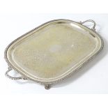 A large oval silver plate tray 23 1/2" x 17 1/2" CONDITION: Please Note - we do