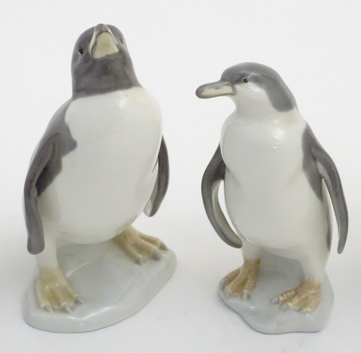 A quantity of Lladro and Nao figures, to include two Lladro penguins and girl holding a chicken, - Image 4 of 11