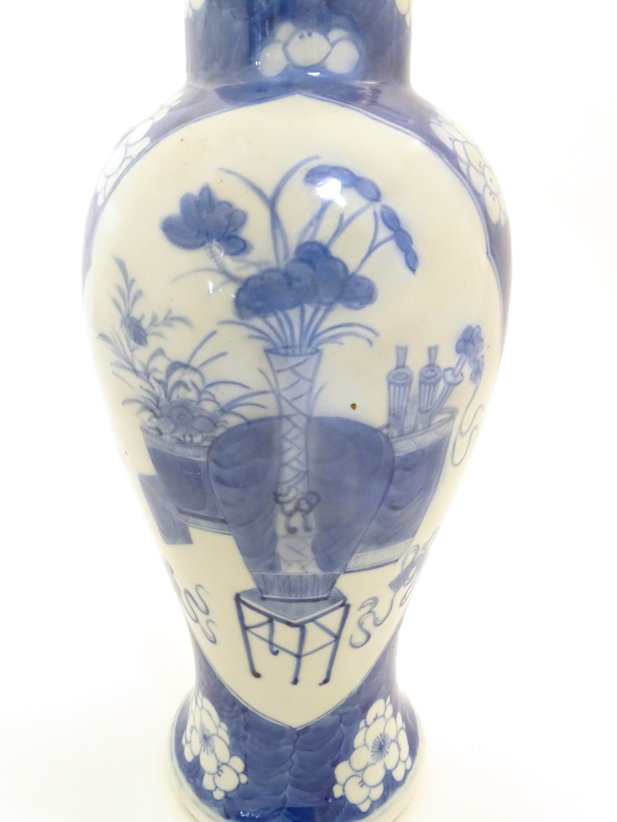 A Chinese, blue and white baluster vase decorated with prunus flowers, - Image 10 of 12
