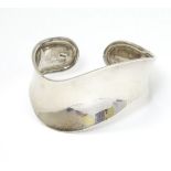 A modernist silver bangle / bracelet CONDITION: Please Note - we do not make