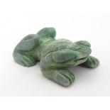 A carved green pendant formed as a frog 1 1/4" CONDITION: Please Note - we do not