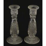 Glass : a pair of cut glass candlesticks with hobnail like decoration and star cut decoration to