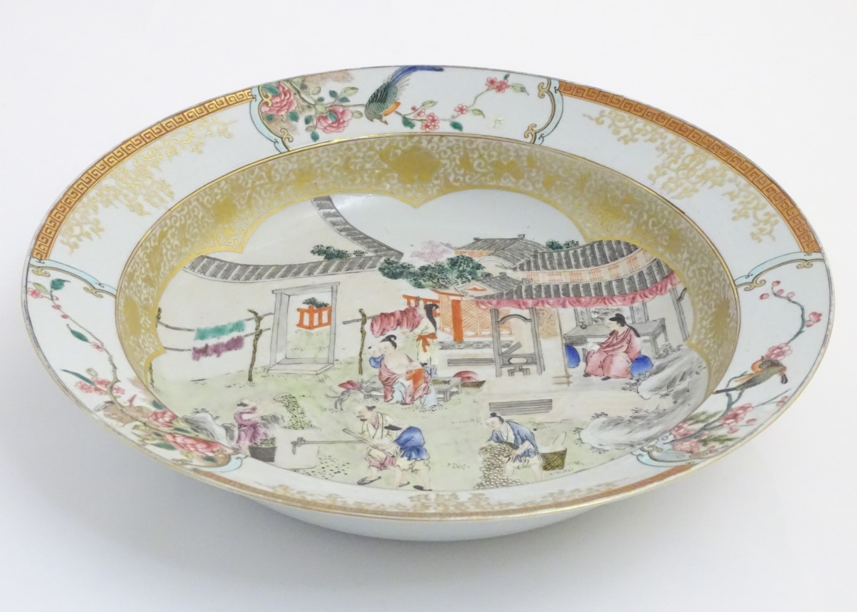 A large Chinese bowl with hand painted scenes of rural life, including a mother and child, - Image 3 of 6