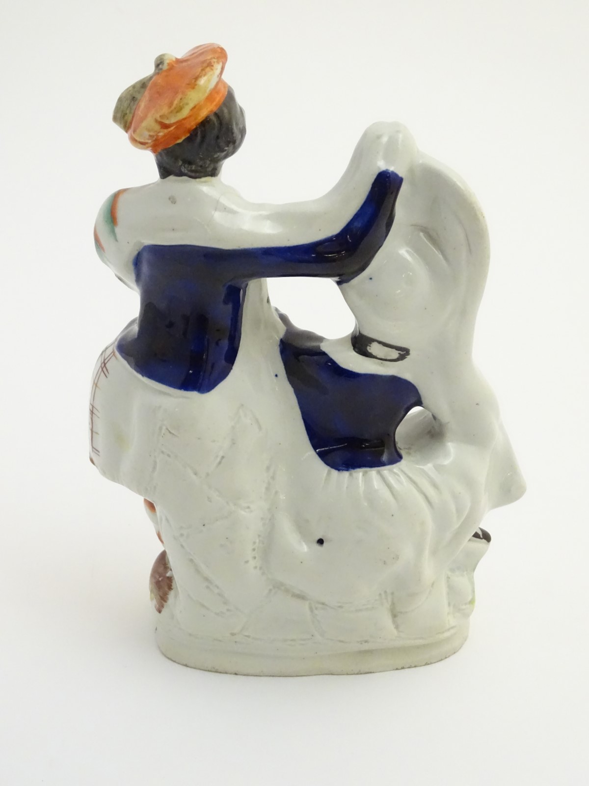 A Victorian Staffordshire pottery figural group of a man and a woman in highland dress, - Image 5 of 6