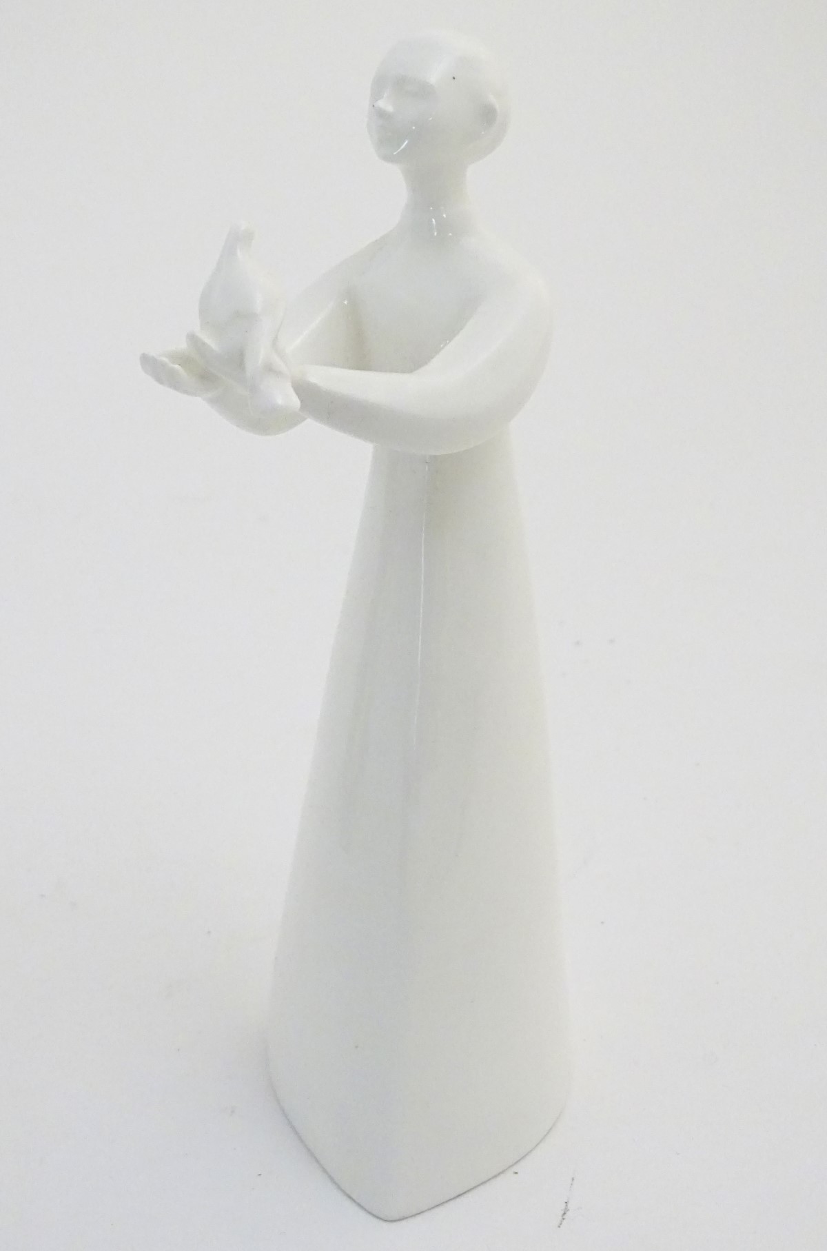 A quantity of Lladro and Nao figures, to include two Lladro penguins and girl holding a chicken, - Image 6 of 11