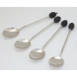 4 silver coffee spoons hallmarked Sheffield 1930 maker C W Fletcher & Son Ltd the handle surmounted