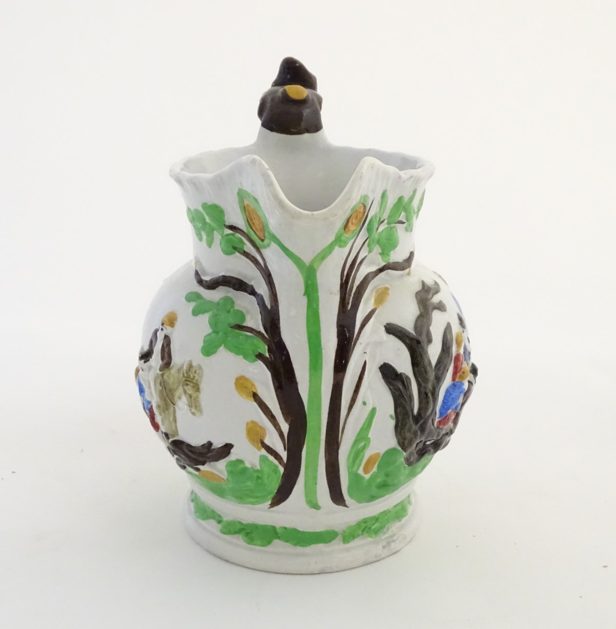 A 19thC Staffordshire Pottery Pratt style jug, depicting figures in a landscape with dogs, a horse, - Image 7 of 8