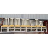 A set of 8 upholstered and white painted mustard seated dining chairs CONDITION: