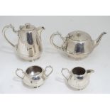 A silver plated tea set by Walker and Hall, comprising teapot, coffee or hot water pot,