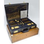 An oak canteen of cutlery box together with a cased set of German cutlery CONDITION: