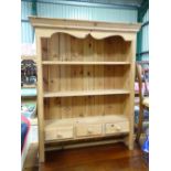 A pine plate rack with 3 drawers under CONDITION: Please Note - we do not make