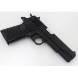 A Colt 1911 BB gun CONDITION: Please Note - we do not make reference to the