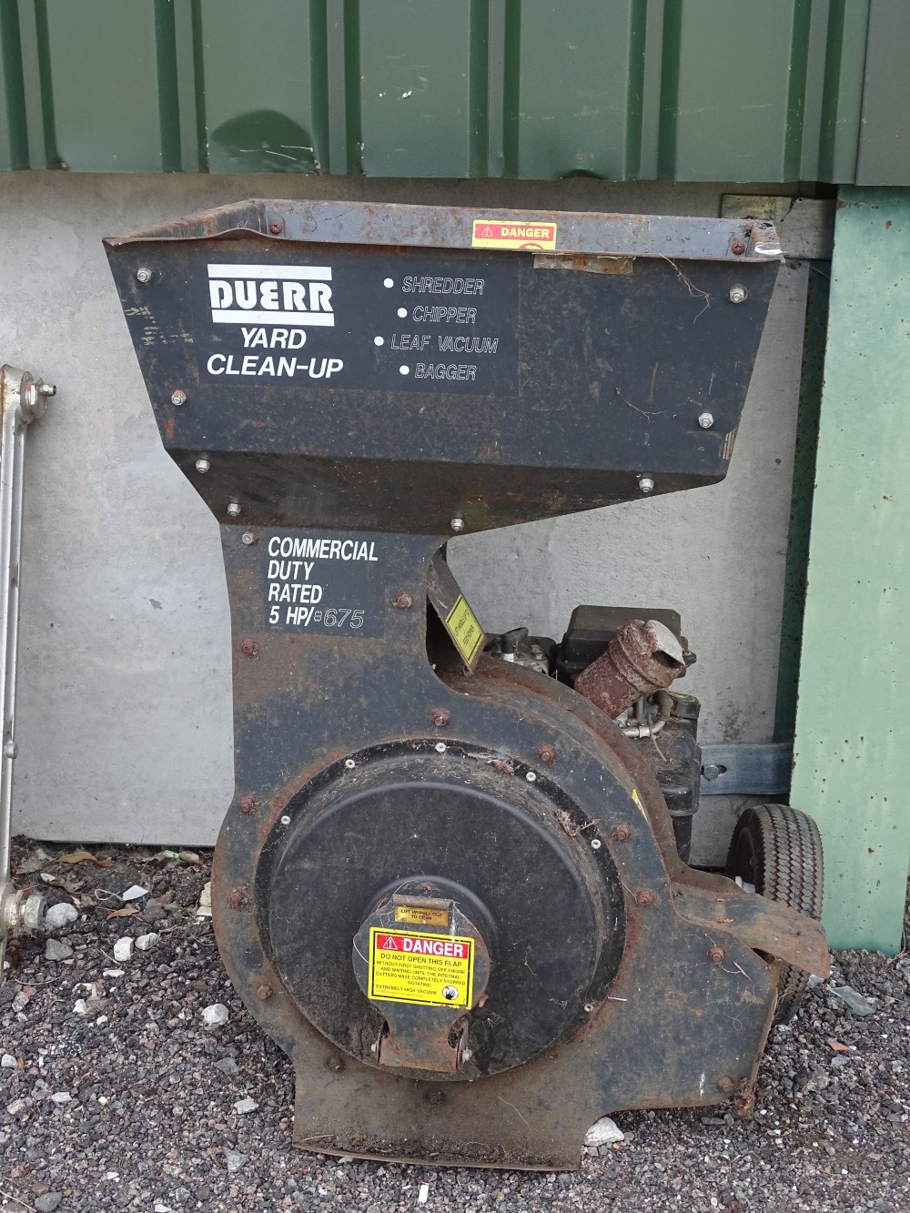 A Duerr yard clean-up machine, combined shredder, chipper,