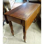 A late Victorian pine and mahogany Pembroke table with a drawer to one end standing on 4 turned