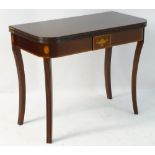 An early 21stC mahogany tea table with Sheraton revival motifs and standing on fluted cabriole legs.