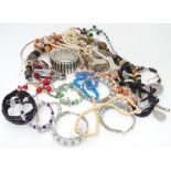 A quantity of assorted costume jewellery, to include necklaces, bracelets etc.